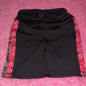 bebe Black Bike Shorts with Red Bandana Side Panels
